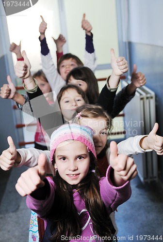 Image of happy children group in school