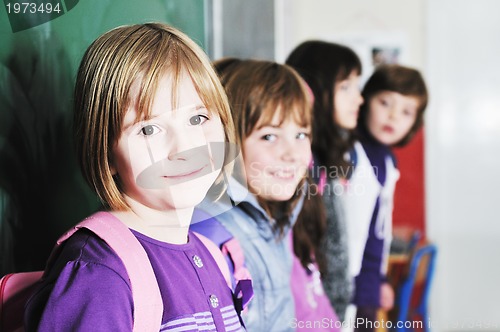 Image of happy children group in school