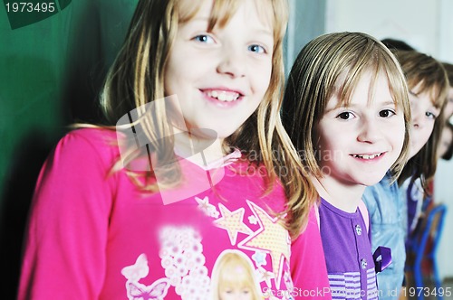 Image of happy children group in school