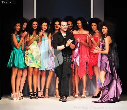 Image of young fashion designer on the stage