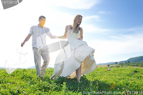 Image of happy bride and groon outdoor