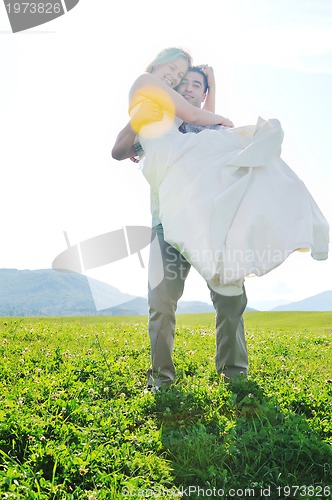 Image of happy bride and groon outdoor