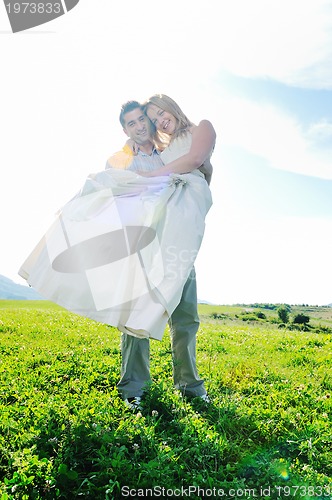 Image of happy bride and groon outdoor