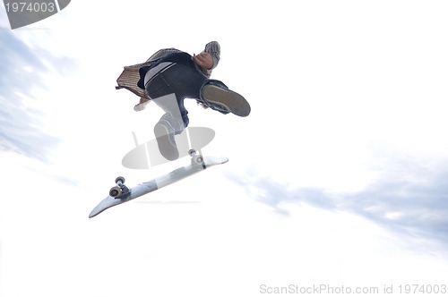 Image of Boy practicing skate in a skate park - isolated