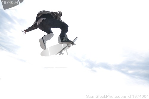 Image of Boy practicing skate in a skate park 