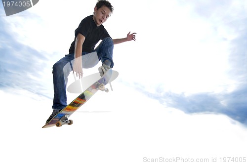 Image of Boy practicing skate in a skate park 