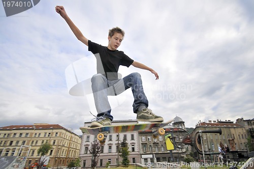 Image of Boy practicing skate in a skate park 
