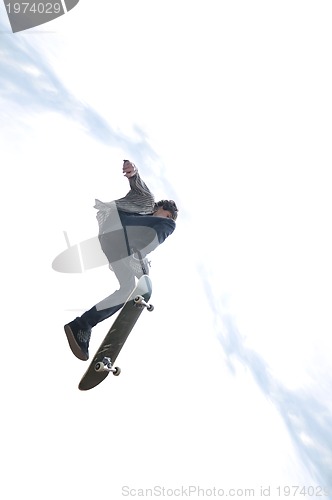 Image of Boy practicing skate in a skate park - isolated