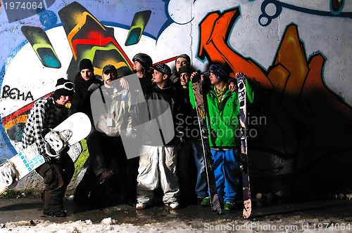 Image of Group of  skiirs standing against background