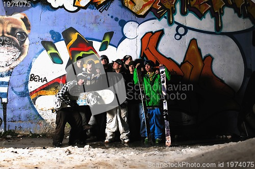 Image of Group of  skiirs standing against background