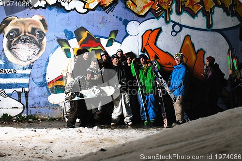 Image of Group of  skiirs standing against background