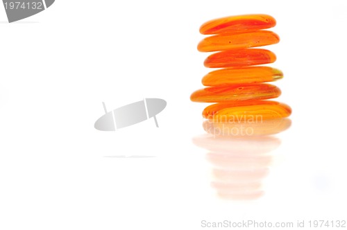 Image of isolated wet zen stones with splashing  water drops  