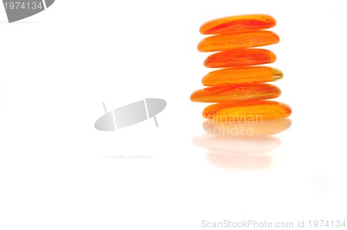 Image of isolated wet zen stones with splashing  water drops  