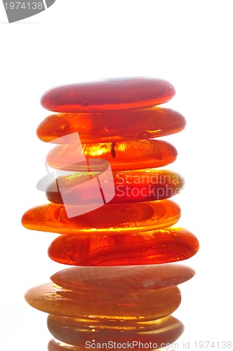 Image of isolated wet zen stones with splashing  water drops  