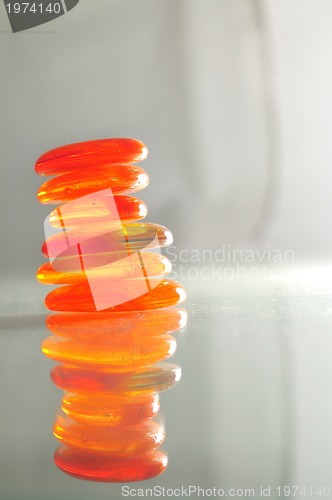 Image of isolated wet zen stones with splashing  water drops  