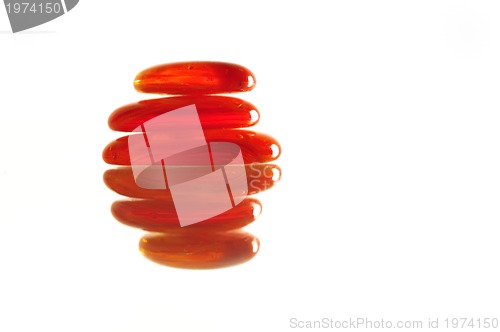 Image of isolated wet zen stones with splashing  water drops  