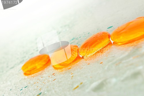 Image of isolated wet zen stones with splashing  water drops  