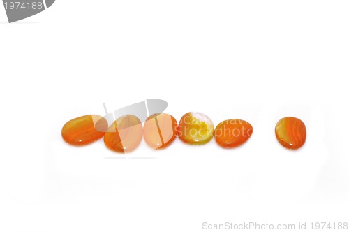 Image of isolated wet zen stones with splashing  water drops  