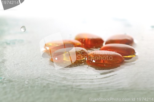 Image of isolated wet zen stones with splashing  water drops