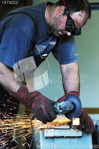 Image of industry worker sparks