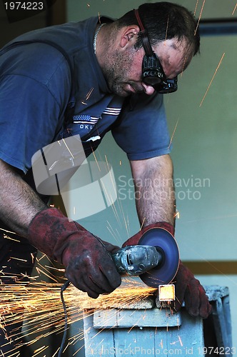 Image of industry worker sparks