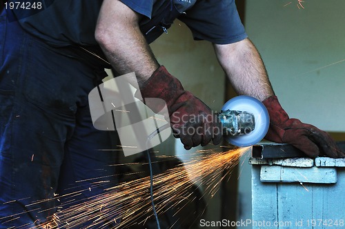 Image of industry worker sparks