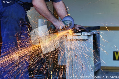 Image of industry worker sparks