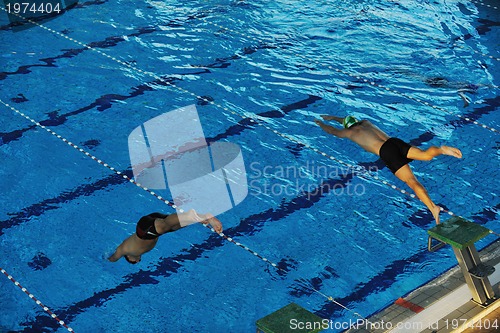 Image of young swimmmer on swimming start