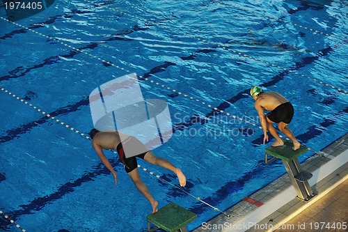 Image of young swimmmer on swimming start