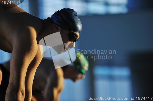 Image of young swimmmer on swimming start