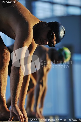 Image of young swimmmer on swimming start