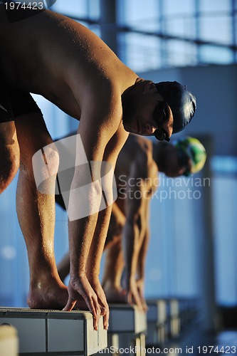 Image of young swimmmer on swimming start