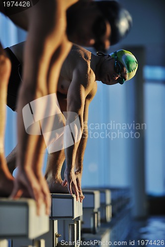 Image of young swimmmer on swimming start