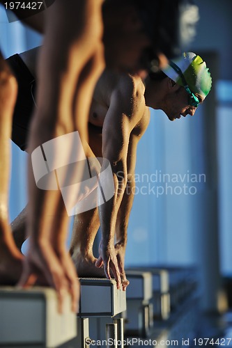 Image of young swimmmer on swimming start