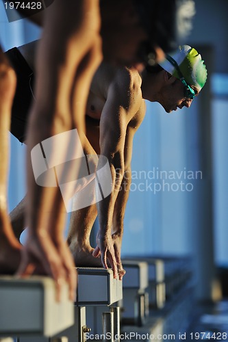 Image of young swimmmer on swimming start