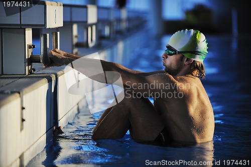 Image of young swimmmer on swimming start