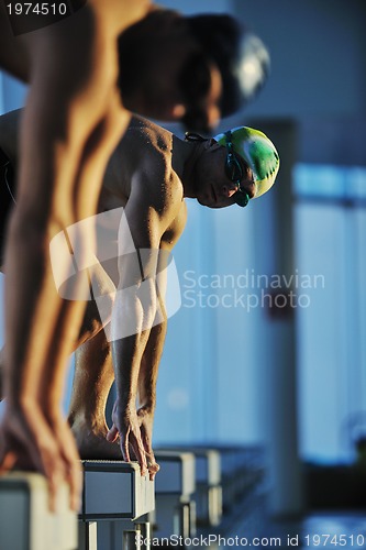 Image of young swimmmer on swimming start