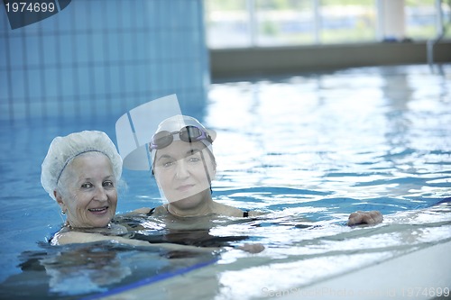 Image of senior woman at swimming pool