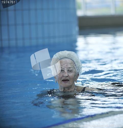 Image of senior woman at swimming pool