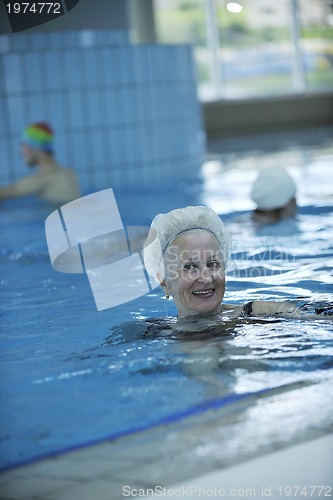 Image of senior woman at swimming pool