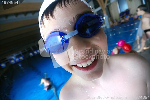 Image of .children having fun at swimming pool