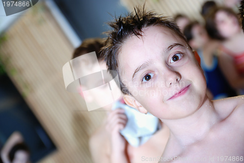 Image of .children having fun at swimming pool