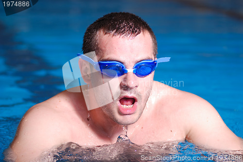 Image of .man in swimming pool