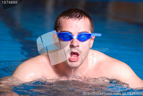 Image of .man in swimming pool