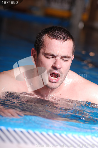 Image of .man in swimming pool