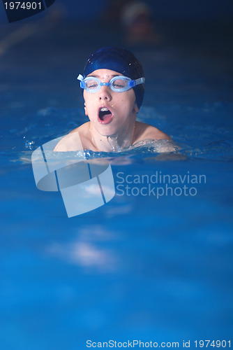 Image of .boy in swimming pool