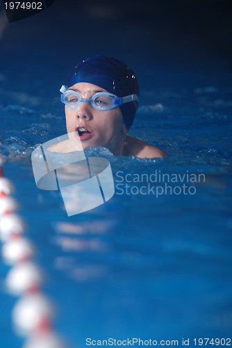 Image of .boy in swimming pool