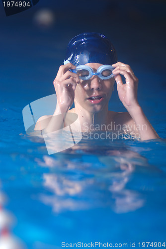 Image of .boy in swimming pool