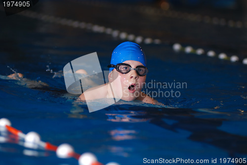 Image of .boy in swimming pool