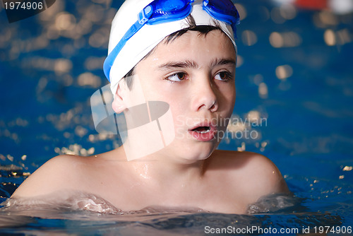 Image of .boy in swimming pool